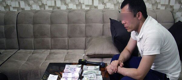 Сотрудники ГУВД города Ташкента задержали подозреваемого в хищении из банка 270 тысяч долларов США - Sputnik Узбекистан