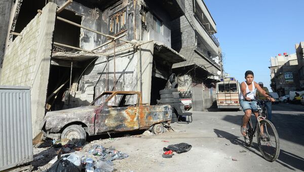 Местный житель в районе Аббас в Дамаске. - Sputnik Узбекистан