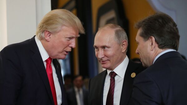 Prezident RF Vladimir Putin i prezident SShA Donald Tramp - Sputnik O‘zbekiston