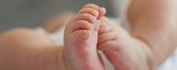 Новорожденный. Архивное фото - Sputnik Ўзбекистон