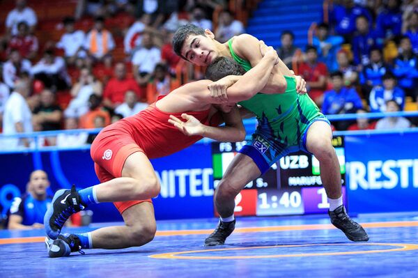 Узбекистанец завоевал первое за 20 лет золото юношеского ЧМ в вольной борьбе Узбекистанец завоевал первое за 20 лет золото юношеского ЧМ в вольной борьбе - Sputnik Узбекистан