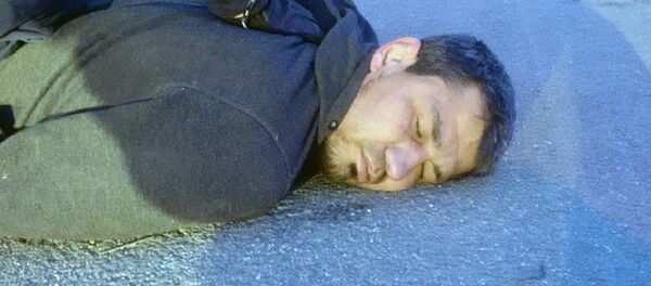 Рахмат Акилов  во время задержания в Стокгольме - Sputnik Узбекистан