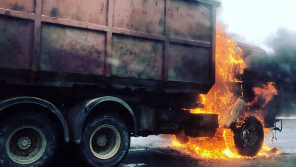 Пожар в кабине автомобиля Камаз. Архивное фото - Sputnik Узбекистан