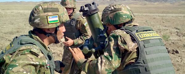 Военнослужащие ВС Узбекистана во время конкурса Мастера артиллерийского огня на АрМи - 2018 Военнослужащие ВС Узбекистана во время конкурса Мастера артиллерийского огня на АрМи - 2018 - Sputnik Узбекистан