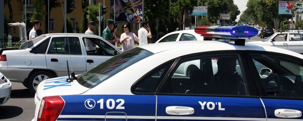 Автомобиль правоохранительных органов Узбекистана на месте ДТП Автомобиль правоохранительных органов Узбекистана на месте ДТП - Sputnik Ўзбекистон