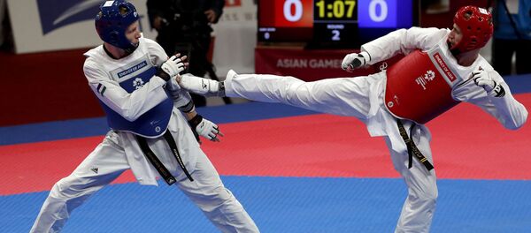 Поединок между Никитой Рафаловичем из Узбекистана и Салехом Аль-Шарабати из Иордании Поединок между Никитой Рафаловичем из Узбекистана и Салехом Аль-Шарабати из Иордании - Sputnik Узбекистан