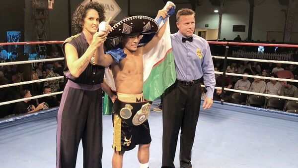 Муроджон Ахмадалиев завоевал чемпионский пояс WBA InterContinental в США - Sputnik Узбекистан