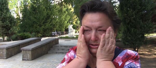 СПУТНИК_Город осиротел, потеряли надежду - жители Донецка об убийстве Захарченко - Sputnik Узбекистан