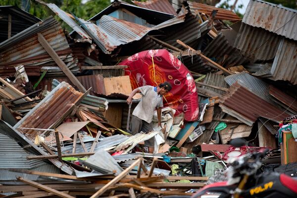 Разрушения после землетрясения и цунами в Индонезии - Sputnik Узбекистан