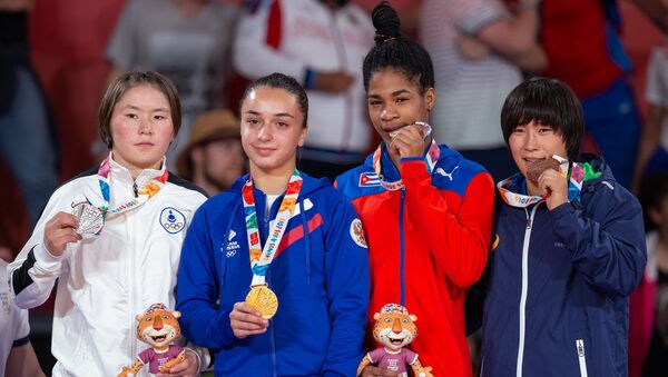 Узбекская дзюдоистка Нилуфар Ермаганбетова завоевала бронзовую медаль юношеских Олимпийских игр в Буэнос-Айресе - Sputnik Узбекистан