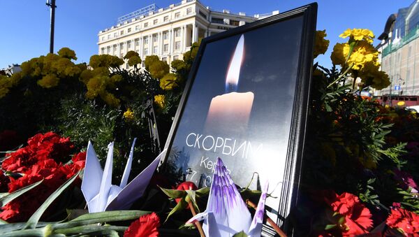 Акции памяти о погибших при нападении на колледж в Керчи - Sputnik Узбекистан